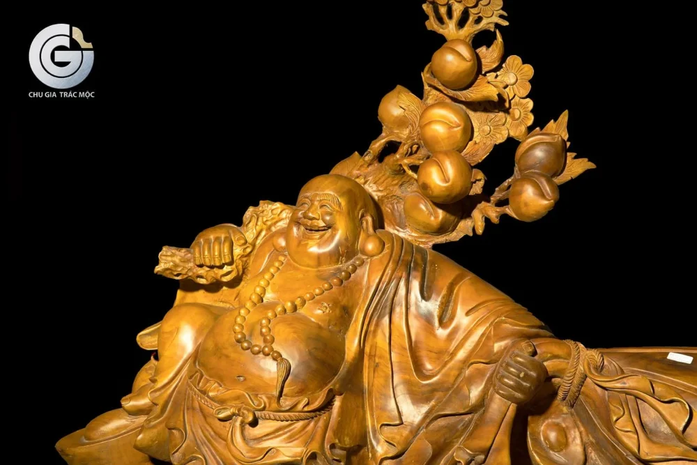Di Lạc kéo bao vàng (gỗ sá xị)
